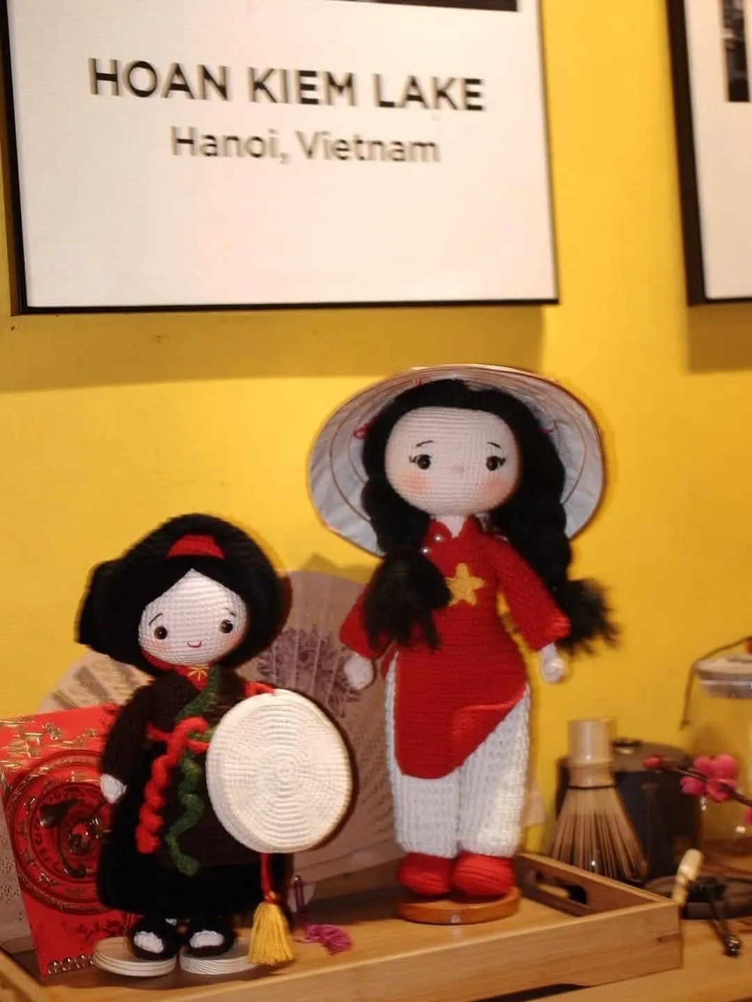 Vietnamese dolls displayed inside the yellow dining room
