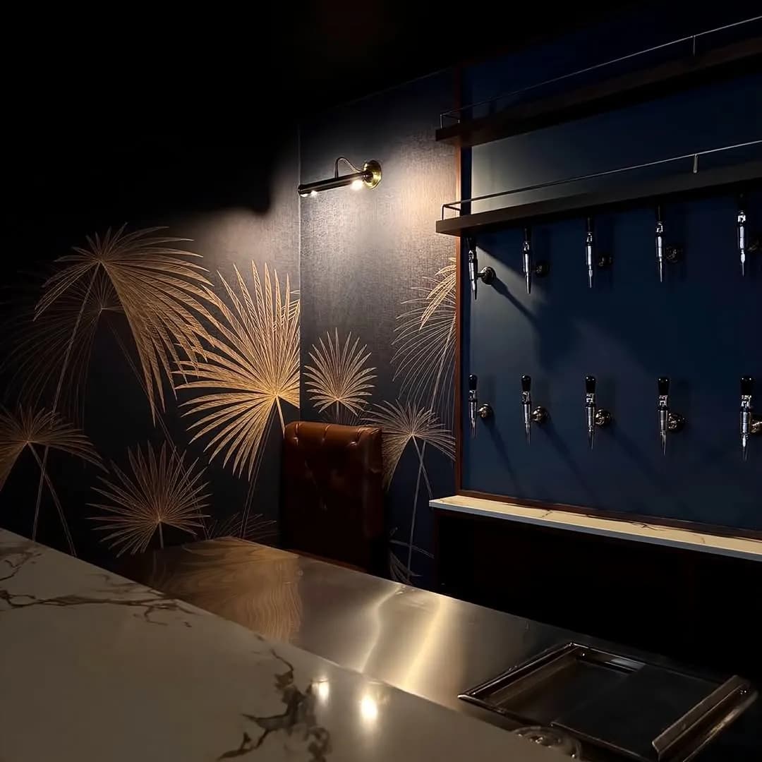 Low-lit seating and cocktail counter inside Reminder