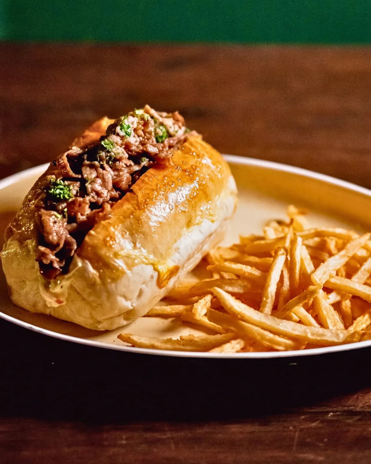 Beef-filled sandwich served with thin fries