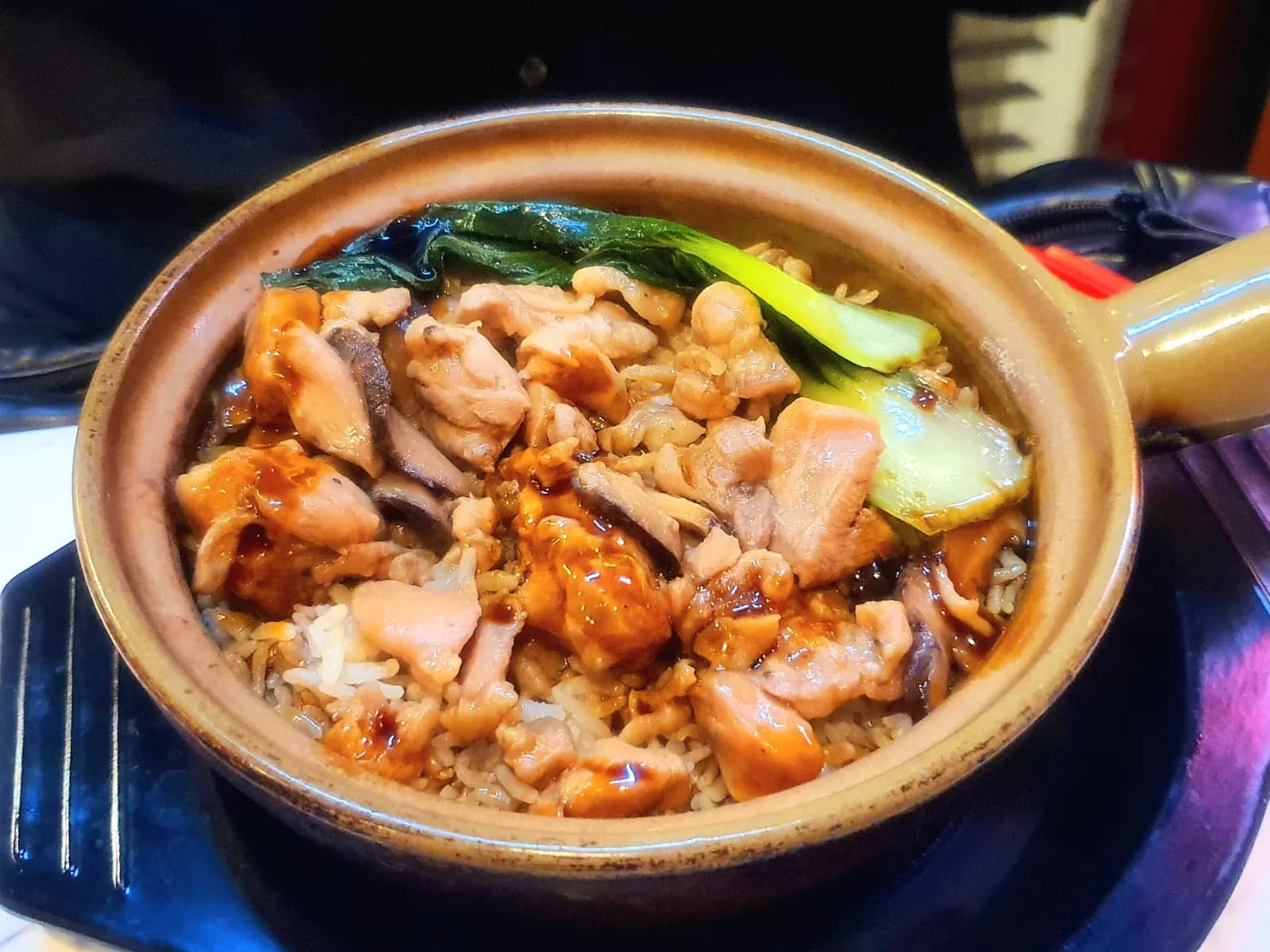 Chicken and mushroom claypot rice with greens