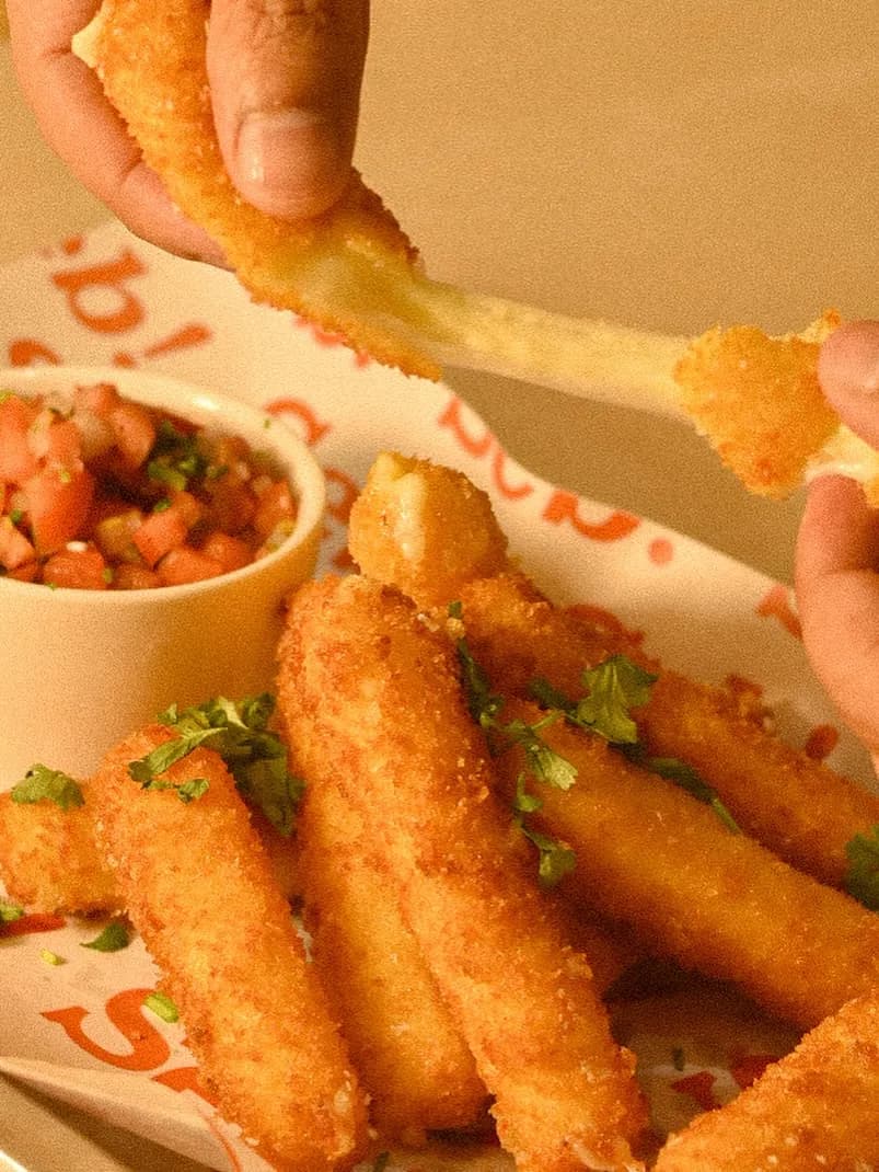 Mozzarella sticks with pico de gallo