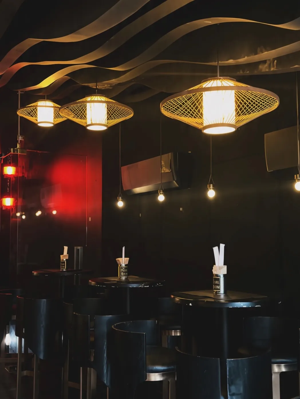 Upstairs private dining room with warm lights and set tables