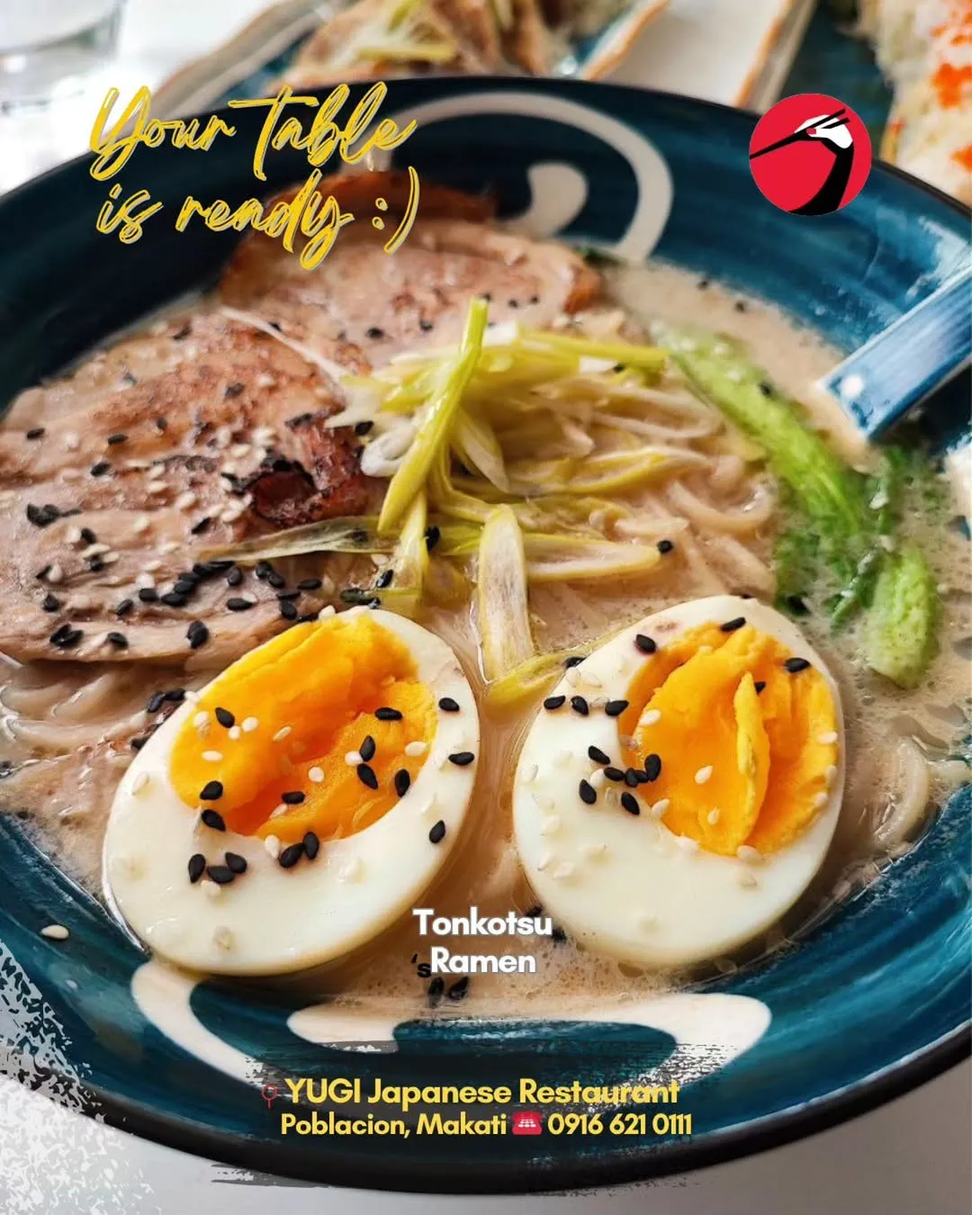 Bowl of tonkotsu ramen with egg, pork and vegetables