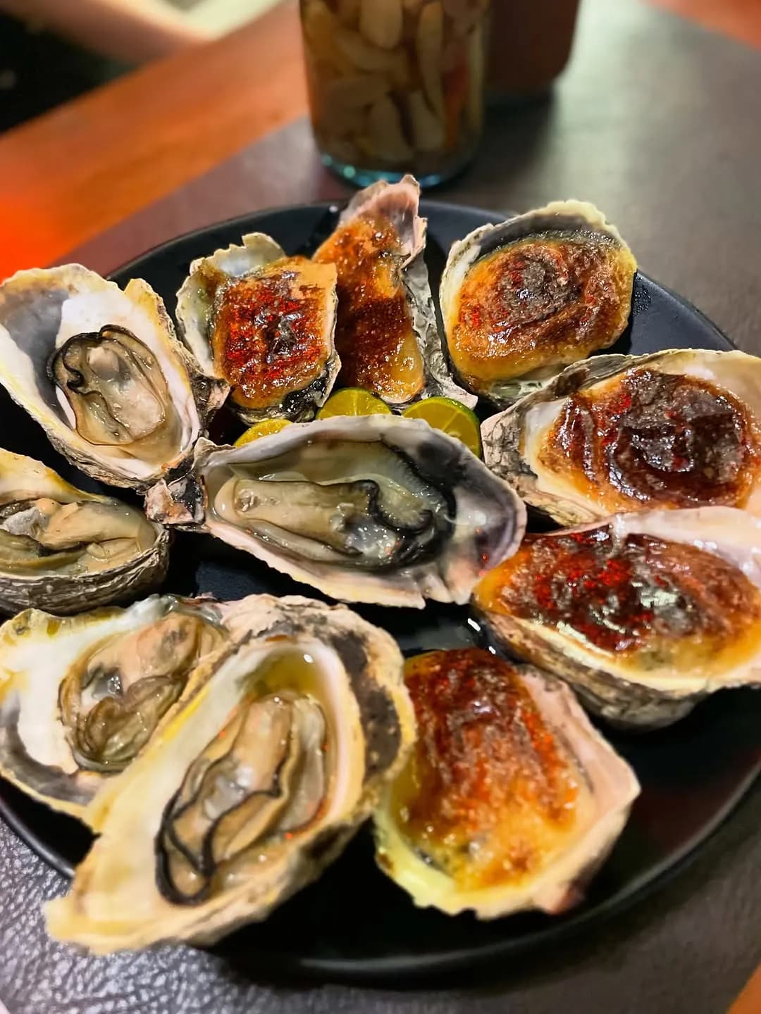 Platter of fresh, baked and grilled oysters