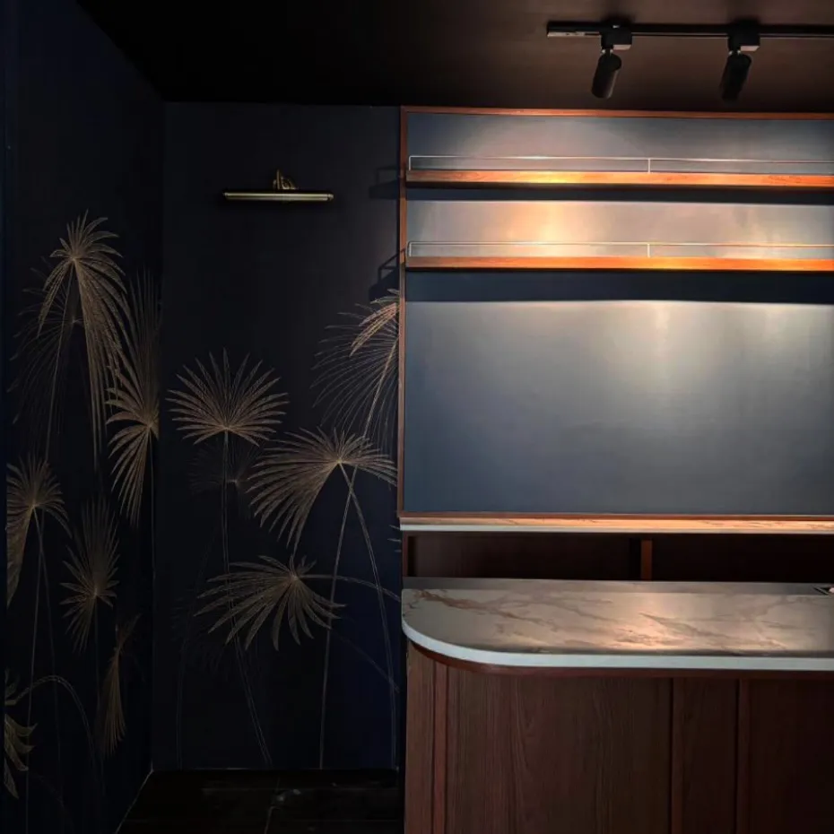Dark bar wall with horizontal amber lights