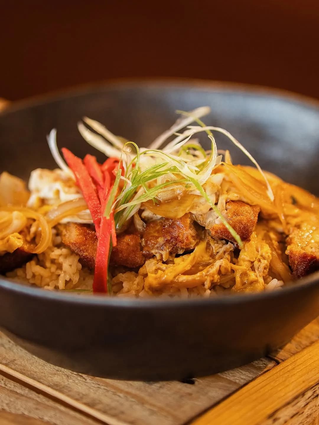 Pork katsu rice bowl with shredded vegetables