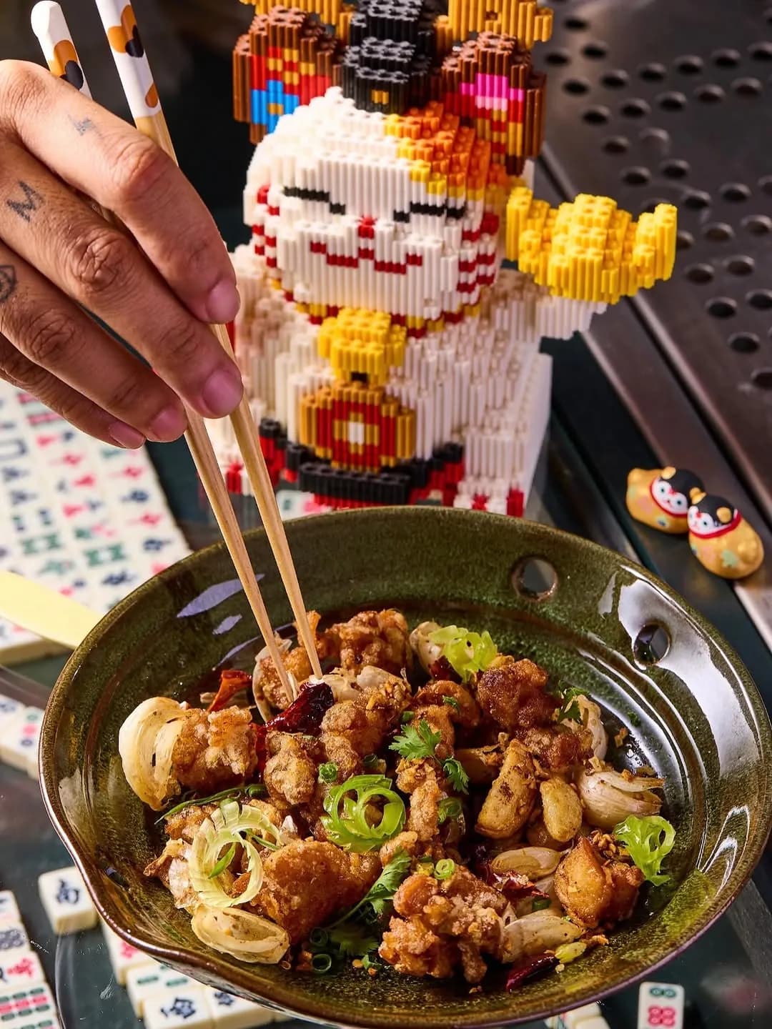Mala chicken served in a metal bowl