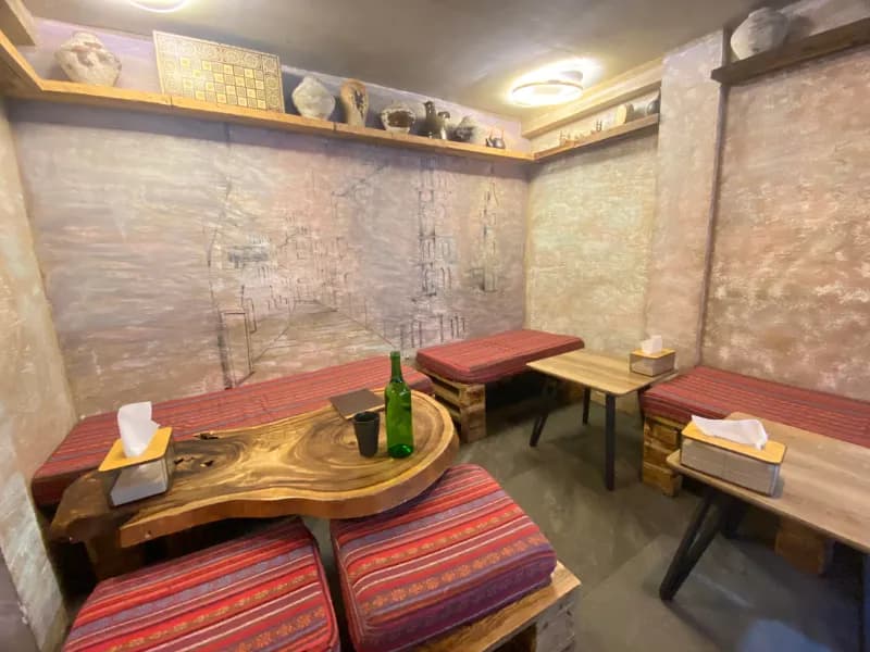 Low tables and bench seating inside La Pita