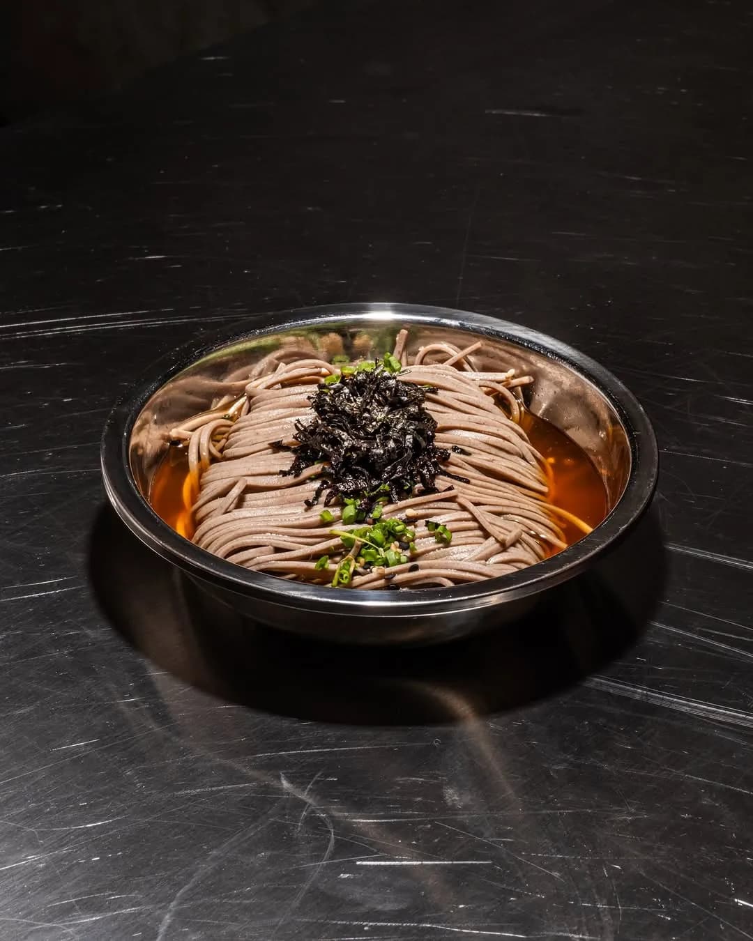 Chilled soba noodles with seaweed and spring onion