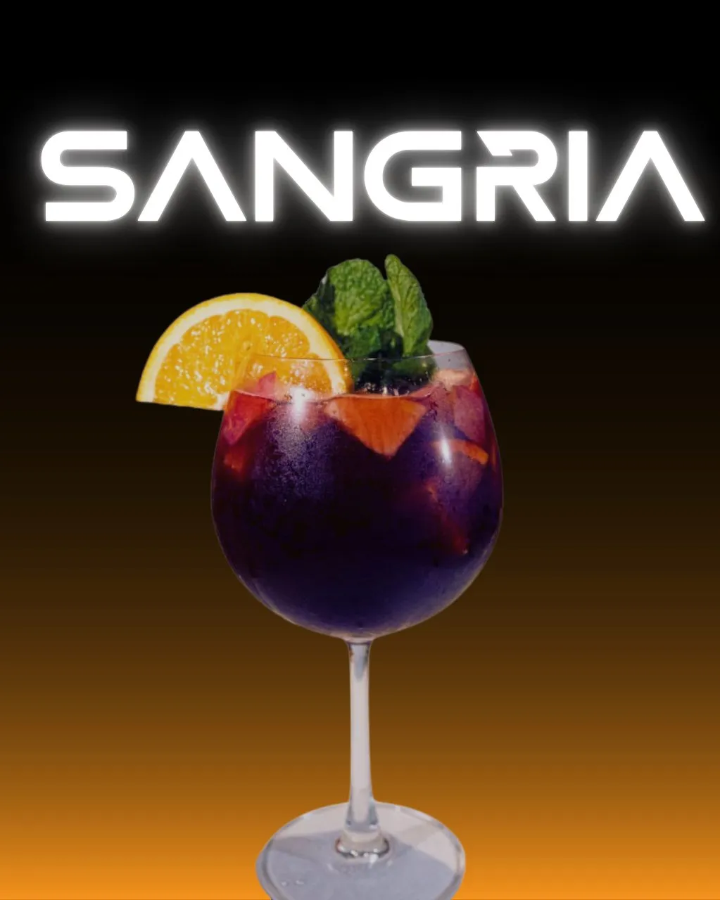 Ruby sangria with fruit, orange and fresh mint.